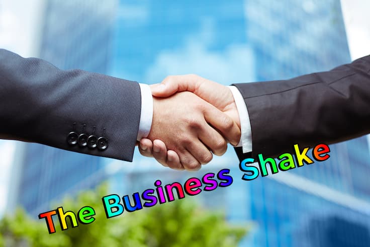 business men in suits shaking hands