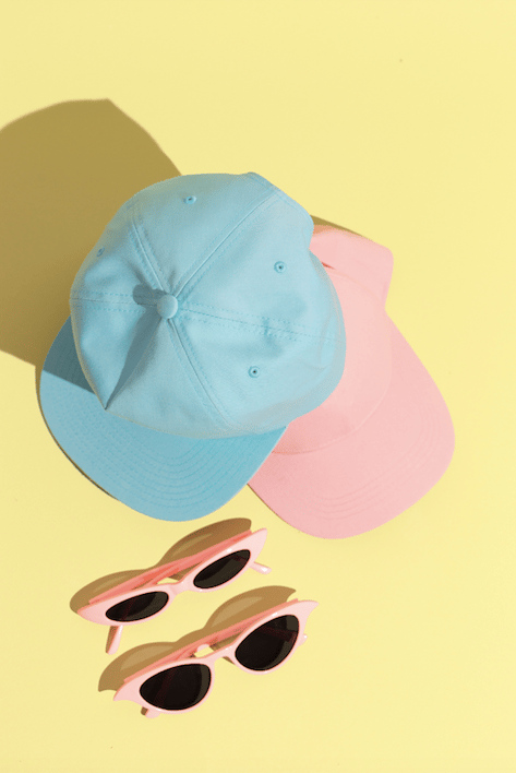 Stylish summer accessories cap and sunglasses. Fashion still life concept by EvgeniyaPorechenskaya