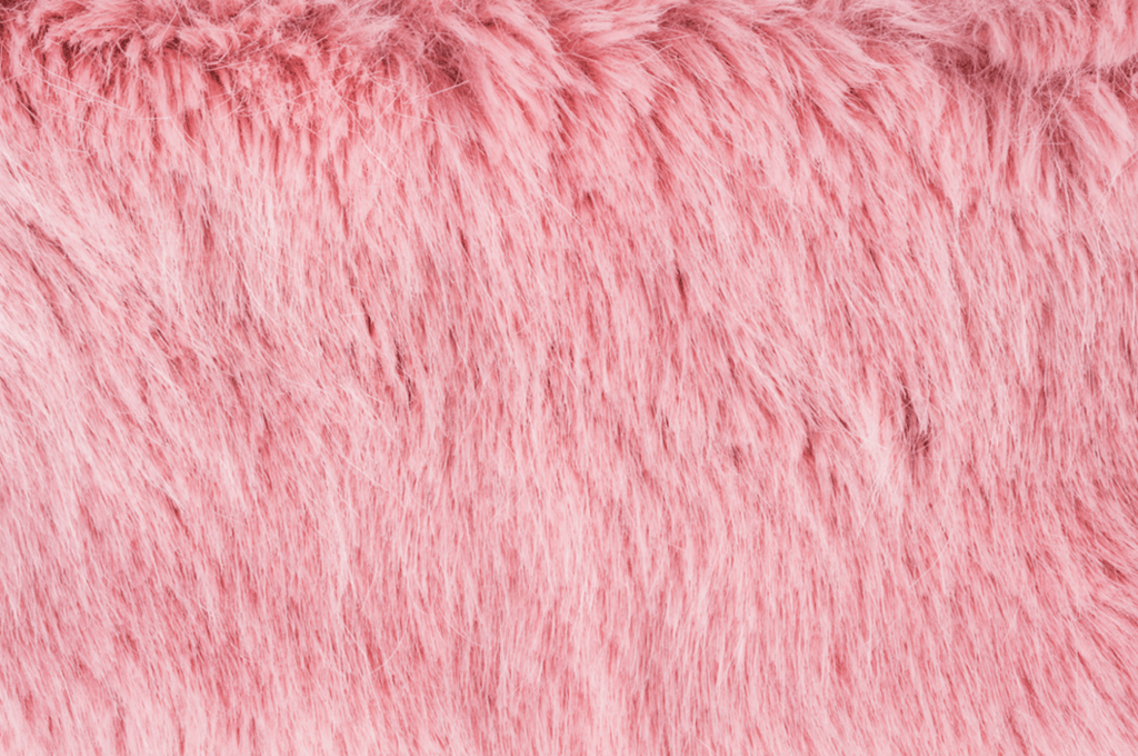 Pink faux fur detail flat lay. Social media by tenkende