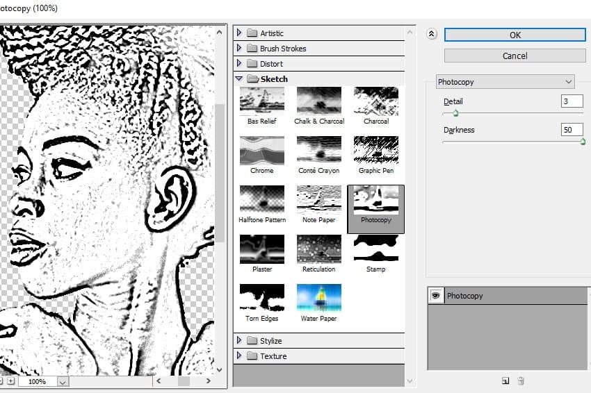 Go to Filter > Sketch and apply the Photocopy filter to the Woman Image Copy layer.