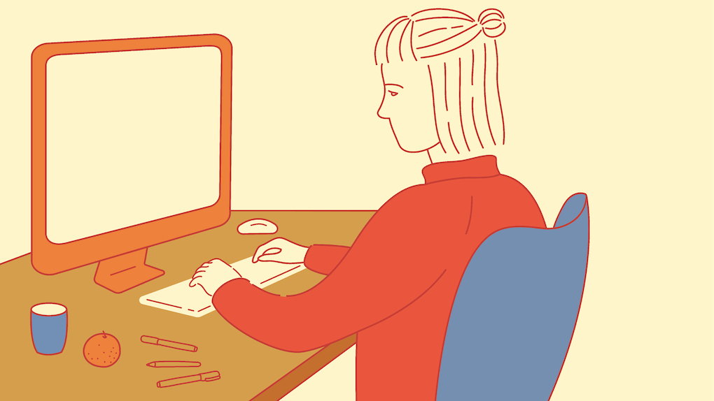 Woman Sitting at Computer Resized - Mixkit