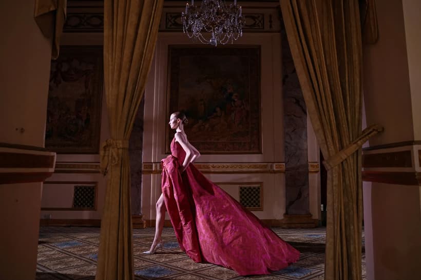 A rich red ball gown from Carolina Herrera complete with flowing train. 